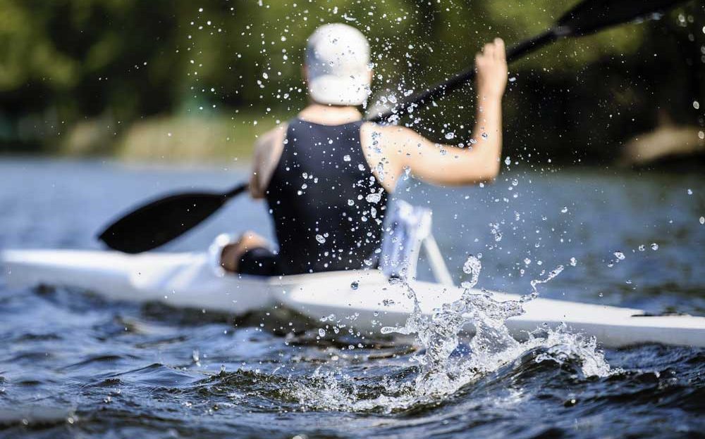 athlete-rowing-kayak-P6ENCTE